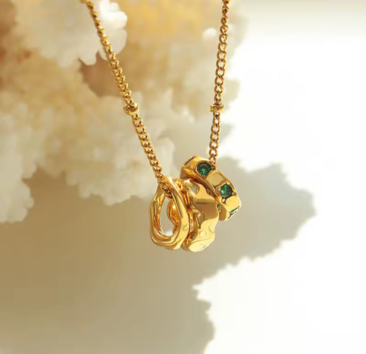 Interlocking Necklace with Emerald Crystal Accents