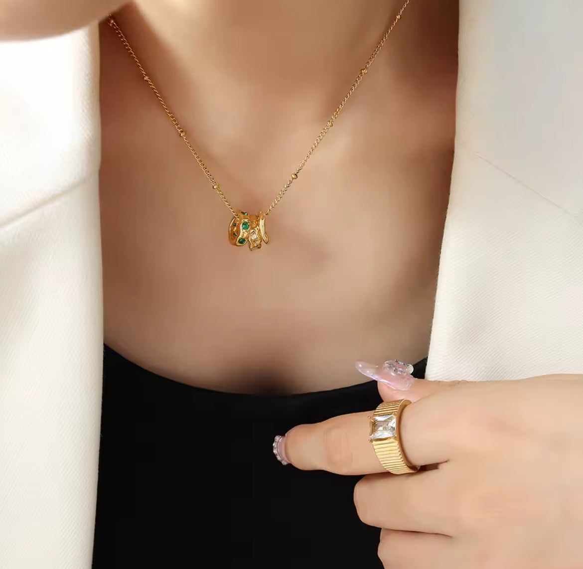 Interlocking Necklace with Emerald Crystal Accents